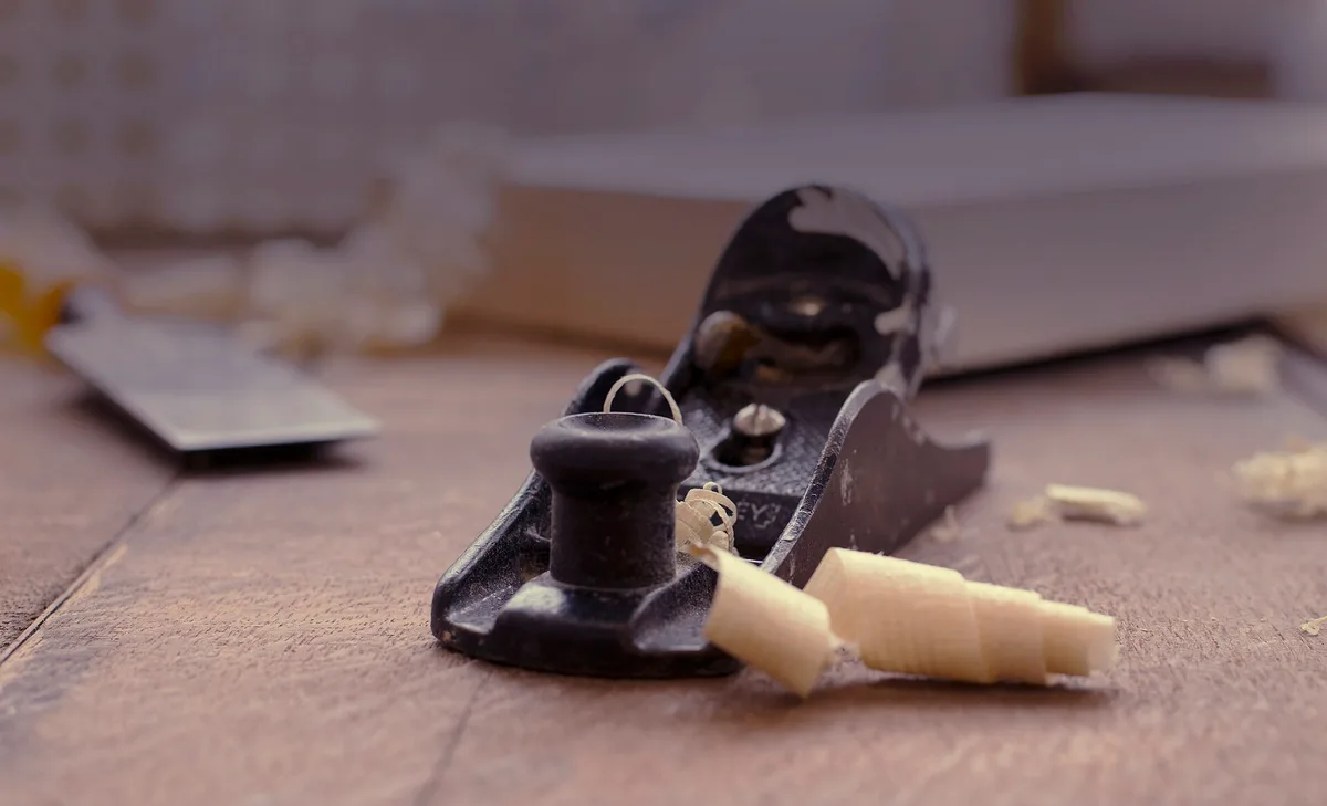 Hand plane and fresh wood shavings